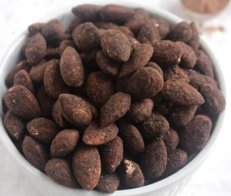 A bowl of chocolate-covered almonds.